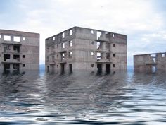 an image of some buildings in the water that are floating on top of each other