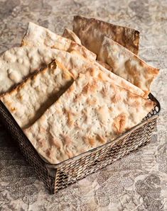 some crackers in a basket on a table