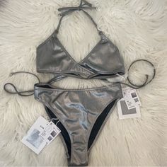 Authentic Brand New Chanel Silver Swimsuit From Cruise Collection. It Is New With Tags And Will Come With Receipt And Chanel Pouch. No Trades. Price Firm. Thanks For Looking! Elegant Metallic Swimwear, Elegant Metallic Swimwear For Party, Chanel Swim, Silver Swimsuit, Chanel Pouch, Cruise Collection, Womens Swim, Chanel, Pouch