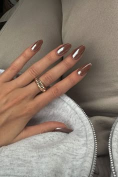 Chrome Nails 2024 Nail Trends Fall Chrome Nails Almond, Fall Nails Chrome Brown, Cool Girl Fall Nails, Brown With Crome Nails, Brown Nails With Pearl Chrome, Hailey Beiber Nails Brown, Brown Chrome Acrylic Nails, Fall Brown Chrome Nails, Fall Nail Inspo Chrome