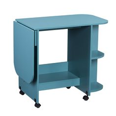 a blue desk with wheels and a shelf on the bottom that has an open drawer