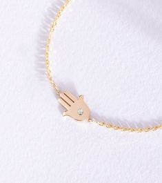 Diamond Hamsa Bracelet 14k 18k Solid Gold, Birthstone Fatima Hand Bracelet, Dainty Diamond Lucky Hamsa Bracelet, Birthday Gift For Her, Gift For Christmas, Good Luck Bracelet  Material: Solid real Gold (not gold filled or gold plated) Gold Karat: 14k (585), 18k (750) Gold Color: Yellow Gold, White Gold, Rose Gold Height of the Hamsa: 11.00 mm Width of the Hamsa: 9.20 mm The size of the hamsa may differ slightly due to handwork. Diamond Color: G-H Diamond Clarity: SI Diamond Weight: 0.03 ct  Brac Hand Set 14k Gold Diamond Bracelet, Dainty 14k Gold Birthstone Bracelets, Dainty 14k Gold Bracelet With Birthstone, Sterling Silver Yellow Gold Bracelets With Birthstone, 14k Gold Bracelet As Gift, Yellow Gold Sterling Silver Bracelets With Birthstone, 14k Gold Bracelet For Gift, 14k Gold Fine Jewelry Bracelet As Gift, 14k Gold Fine Jewelry Bracelet Gift