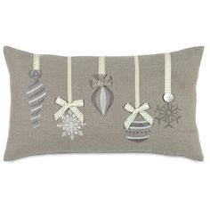 a decorative pillow with ornaments on it