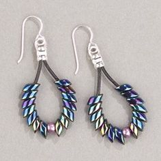 two pairs of earrings with beads hanging from them