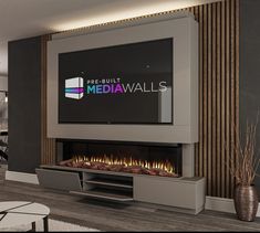 a fireplace with a television mounted on it's side and the words pre - built media walls above it