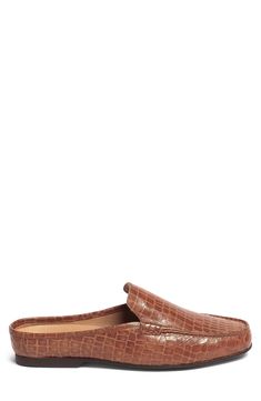 Croc-embossed leather adds a luxe appeal to this slip-on mule grounded by a grippy rubber sole. Moc toe Slip-on style Leather upper and lining/rubber sole Imported Slip On Mules, Leather Mules, Embossed Leather, Mule, Nordstrom Rack, Rubber Sole, Leather Upper, Slip On, Nordstrom