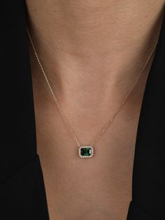 This 14K Gold Green Emerald Halo Necklace with its delicate Cz Green Emerald Halo Pendant exudes vintage charm, making it a timeless piece. An exquisite choice for an Anniversary and Christmas Gift, it adds a touch of elegance to any ensemble. A thoughtful and beautiful adornment for her special occasions. Pendant Width: 0.37 inches / 9.40 mm Pendant Height: 0.30 inches / 7.62 mm Product Features: * Made to Order  * Gold KT: 14K Solid Gold (not filled, not gold vermeil, not plated) * Gold Color: Celtic Mandala, Mandala Pendant, Pink Cosmos, Emerald Green Necklace, Green Stone Pendant, Emerald Halo, Baguette Necklace, Inexpensive Jewelry, Diamond Pendants Designs