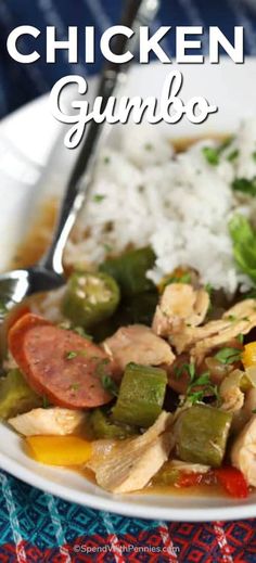 a white plate topped with chicken gumbo and rice