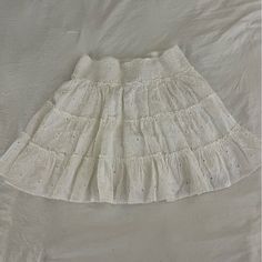 Super Cute Skirt For Summer And Spring! Never Worn And Has Tags!! Adjustable Waistband So Could Definitely Size Up! Cute White Cotton Skirt, Cute White Skirt With Elastic Waistband, Cute White Tiered Skirt, Cute White Mini Skirt For Spring, Cute White Mini Length Bottoms, Cute White Mini Bottoms, Cute White Skirted Bottoms, Summer White Cotton Mini Skirt, White Mini Skirt For Vacation