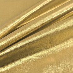 Content: 51% Metallic Polyester / 49% Nylon Width: 45" Wide Washing Instruction: Hand Wash or Dry Clean Weight: Very Light Weight The Gold Lame Fabric is lightweight and comes with a nylon filament which creates a shiny, luminous effect. It's great for costumes, home decor, clothing, and all sorts of accessories. Please Remember to Type the Number of Yards into the Quantity Box and Click Add to Cart. Fabric Order Is Cut After the Order Is Placed in One Continuous Piece. For Example: If You Order Lame Fabric, Gold Lame, Silver Fabric, Gold Bullion, Bridal Party Dresses, Metallic Fabric, Chair Decorations, Gold Fabric, Yellow Aesthetic