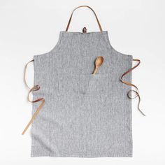 an apron with a wooden spoon in it