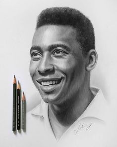 a pencil drawing of a smiling man with two crayons in front of him