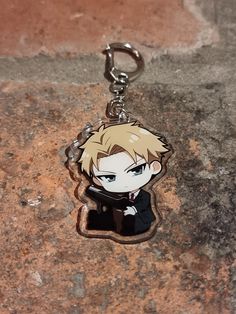 a key chain with an anime character on it