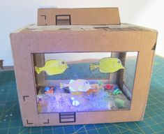 an open cardboard box with fish in it