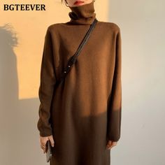 Brand Name: BGTEEVERSilhouette: StraightOrigin: CN(Origin)Season: Spring/AutumnNeckline: TurtleneckSleeve Style: RegularStyle: CasualDresses Length: Mid-CalfMaterial: CottonMaterial: AcrylicAge: Ages 18-35 Years OldProfile Type: HModel Number: BY5908Closure Type: PulloverSleeve Length(cm): FullType: RegularRelease Date: Autumn 2021Fabric Type: KnittingGender: WOMENMaterial Composition: Natural fiberWaistline: empirePattern Type: Solidseason: autumn winteritem type: women dress Xmas Party Dresses, Vestidos Casual, Sweater Dress Casual, Christmas Dress Women, 90s Outfit, Womens Summer Shoes, Sweater Dress Women, Turtle Neck Dress, Winter Boots Women