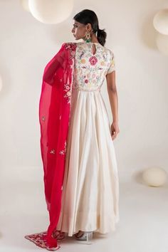 Ivory half sleeves flared chanderi anarkali with gul bloom aari embroidery on the yoke using pearls-beads highlights. Paired with a contrasting rani pink scallop bloom border dupatta. - Aza Fashions Bollywood Style Traditional Wedding Wear With Short Sleeves, Bollywood Style Short Sleeve Traditional Wedding Wear, Festive Traditional Wear For Wedding With Short Sleeves, Short Sleeve Traditional Wear With Resham Embroidery For Wedding, Festive Wedding Lehenga With Short Sleeves, Wedding Sets With Resham Embroidery And Short Sleeve, Short Sleeve Lehenga With Pallu For Wedding, Wedding Short Sleeve Sets With Cutdana, Short Sleeve Wedding Sets With Cutdana