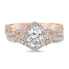 a rose gold engagement ring with an oval center surrounded by round diamonds