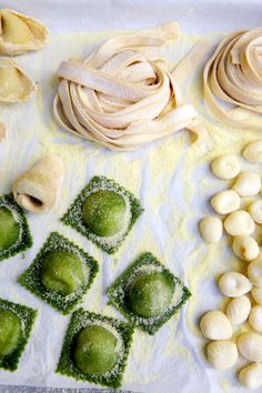 some food is laying out on top of the paper and ready to be put in the oven