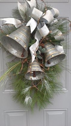 a wreath with bells hanging from it's side