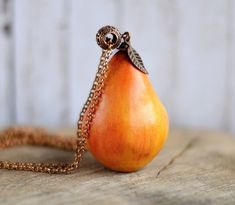 "Long charm necklace with yellow pear pendant, Cute gift jewelry for vegan pear 2\"x 1\" (5x3cm) chain 32\" (80cm) more fruit jewelry https://www.etsy.com/listing/496706714/chunky-charm-pendant-long-boho-necklace?ref=shop_home_active_1 Please, keep the jewellery away from perfume and other alcohol containing fluids because the alcohol damages the Polymer clay. Store the fragile items in separate boxes and treat them with care. Misuse may result in damage. Visit my shop https://www.etsy.com/shop/ Orange Pear-shaped Jewelry, Handmade Pear-shaped Necklace For Gift, Handmade Pear-shaped Necklace Gift, Yellow Teardrop Necklace For Gifts, Orange Pear-shaped Jewelry For Gifts, Pear-shaped Orange Jewelry Gift, Orange Drop Jewelry For Gift, Handmade Pear-shaped Jewelry For Gifts, Amber Pear-shaped Jewelry Gift