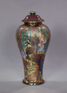 an ornate vase with colorful designs on it