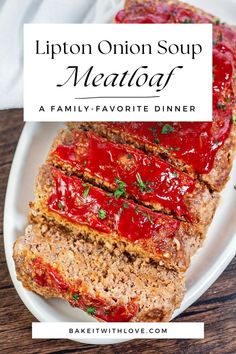 An overhead shot of a cooked meatloaf with caramelized ketchup topping sliced in an oval baking dish. Lipton Onion Soup Mix Meatloaf, Onion Soup Mix Meatloaf, Lipton Onion Soup Meatloaf Recipe, Beefy Onion Soup, Lipton Onion Soup Meatloaf, Baked Meatloaf, Classic Savory, Crockpot Meatloaf