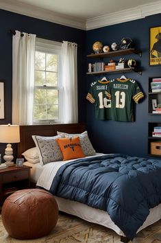 a bedroom with a football jersey hanging on the wall and a bed in front of it