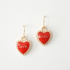 Love heart charm on 18k gold plated fish hook findings. - Approx. 13x16mm charm SHOP MORE JEWELRY, https://www.etsy.com/shop/melissavelia?section_id=10442322 Cute Gold Earrings With Heart Charm, Heart-shaped Charm Earrings For Anniversary, Cute Gold Heart Charm Earrings, Cute Gold Heart Earrings For Mother's Day, Heart-shaped Charms Earrings For Valentine's Day, Heart-shaped Earrings With Charms For Valentine's Day, Heart-shaped Charm Earrings For Valentine's Day, Cute Gold Heart Earrings Nickel Free, Cute Gold Heart Bead Earrings