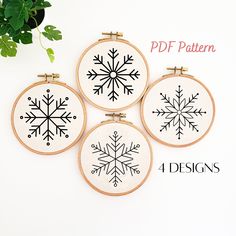 four cross stitch snowflakes are shown in three different sizes and shapes, with the text 4 designs below them