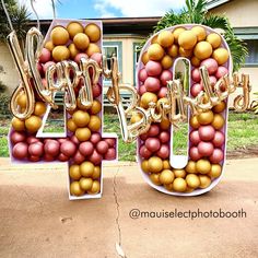 the letters are made out of balloons and balls