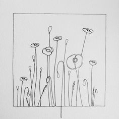 an ink drawing of flowers on paper