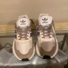 Unisex Brand New Multi Colored Adidas Tan/Beige,Purple,Pink With A White Sole Casual Purple Adidas Running Shoes, Casual Purple Sneakers With Air Max Cushioning, Adidas Purple Lace-up Running Shoes, Adidas Purple Sporty Running Shoes, Adidas Pink Sneakers With Air Cushioning, Sporty Purple Adidas Sneakers, Comfortable Purple Running Sneakers, Purple Casual Running Sneakers, Casual Purple Sneakers For Jogging