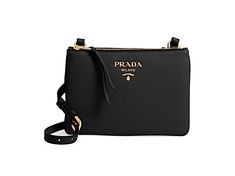 This cute and practical everyday crossbody Prada bag is the perfect accessory to add luxury to any everyday outfit. The double zipper with a center compartment dividing the two zipper pockets give the added feature of tons of space in a small compact crossbody style bag. The color of this bag is beautiful and classic, which makes this the perfect neutral bag for your handbag collection.      Model: 1BH046  Black Vitello Phenix Leather  Adjustable and Detachable crossbody strap  Gold-tone hardwar Luxury Travel Shoulder Bag With Metal Zipper, Luxury Crossbody Bag With Metal Zipper, Luxury Black Bags With Metal Zipper, Evening Crossbody Bag With Metal Zipper, Travel Crossbody Bag With Metal Zipper, Everyday Crossbody Bag With Metal Zipper, Yellow Watches, Neutral Bag, Michael Kors Fashion