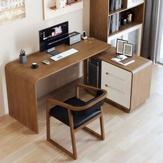 a wooden desk with a computer on top of it