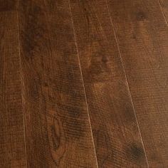 wood flooring with dark brown stain on it