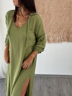 Step into the sunshine with our Muslin Green Maxi Dress. Crafted from soft cotton with long sleeves, this dress offers a comfortable fit perfect for any day out. Its minimalist design makes it versatile enough for a boho-inspired wedding or a romantic beach getaway. A beautiful gift for her, this dress blends effortless style with casual elegance. Key Features ✨ * Material: Soft, breathable organic cotton that offers luxurious comfort while being environmentally friendly. * Size: One size, our m Cotton Boho Dress, Wedding Dress Romantic, Minimalist Wedding Dress, Dress Minimalist, Long Sleeve Cotton Dress, Green Maxi Dress, Boho Sun, Minimalist Wedding Dresses, Romantic Beach