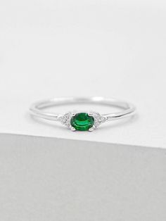 Oval Cubic Zirconia Stackable Rings, Green Oval Dainty Rings, Dainty Green Oval Ring, Dainty Oval Cubic Zirconia Ring, Oval Vs Clarity Birthstone Promise Ring, Dainty Green Oval Birthstone Ring, Oval Crystal Promise Ring For May Birthstone, Oval Cubic Zirconia Emerald Birthstone Ring, Oval Emerald Stackable Rings