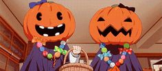 two large pumpkins with faces on them are standing next to each other