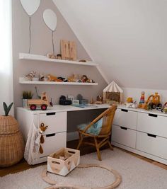 a child's room with toys on the shelves