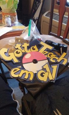 there is a bag that says gota tech emo on it and an umbrella in the background