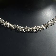 silver fancy multi round link chain necklace 925 sterling silver 5.00mm wide fancy chain necklace featuring an intricate multi round link design     100% recycled silver     Necklace length: 54cm/21.25 inch     Weight: 53.4g Fastened with a ring and toggle, this silver necklace features a full set of UK hallmarks from the London Assay Office. Please follow the link below to view more of our chains: https://www.etsy.com/uk/shop/IceniSilvercraft?ref=seller-platform-mcnav&section_id=27113657 Silver Celtic Jewelry, 9ct Gold Earrings, Solid Silver Bracelets, November Birthstone Jewelry, February Birthstone Jewelry, January Birthstone Jewelry, October Birthstone Jewelry, April Birthstone Jewelry, March Birthstone Jewelry