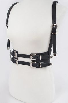 Get ready to buckle up in style with our Multi Buckle Harness Belt! This versatile accessory adds a touch of edgy flair to any outfit, while providing practical benefits like adjustable fit and extra support. So go ahead, strap on this must-have accessory and take your look to the next level (safely, of course)! How To Style A Harness, Chain Outfit Aesthetic, Belt Reference, Strap Outfit, Leather Harness Outfit, Wing Harness, Goth Harness, Body Harness Outfits, Belts Design