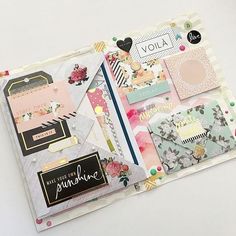 the inside of a scrapbook with different types of paper