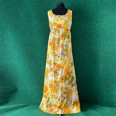 Vintage 60s Hawaiian maxi dress. Bark cloth fabric--feels like cotton or a blend though I'm not certain of the fabric composition--with an amazing floral print that has an ink sketch/watercolor look to it. Empire waist, bodice lined with yellow cotton, closes with a metal zipper down the back. Has a small old mend on the waist. No labels, likely homemade. Measurements taken flat (doubled where necessary): Chest - 34" High Waist - 30" Waist - free Hips - 44" Length - 57" Empire Waist Floral Print Maxi Dress For Beach, Vintage Printed Maxi Dress For Vacation, Retro Multicolor Floral Print Maxi Dress, Multicolor Retro Maxi Dress With Floral Print, Vintage Summer Maxi Dress With Retro Print, Vintage Printed Maxi Dress For Beach, Retro Floral Print Maxi Dress For Vacation, Retro Floral Print Maxi Dress, Vintage Floral Print Maxi Dress For Garden Party