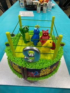 a wrestling ring cake on top of a table