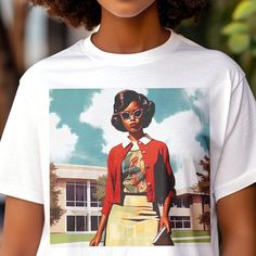 This unisex adult shirt showcases an image of a young black woman dressed in a vintage 1950s or 60s style. The design draws inspiration from black and fashion history too. Crafted from 100% cotton, this shirt guarantees comfort and breathability. It's available in various sizes and an array of colors. Designed with reinforced side seams for enhanced durability, it also offers a sleek retail fit that exudes style. Ensure the perfect fit by referring to our measurement chart included with the product images. Easily customizable upon request. Shop for more: https://www.etsy.com/shop/thetrinigee Retro Fitted Shirt With Screen Print, Retro Fitted Pre-shrunk Top, Retro Fitted Top, Retro Short Sleeve Shirt With Custom Print, Vintage Fitted Shirt With Screen Print, Retro Custom Print Tops For Streetwear, Retro Cotton Top With Custom Print, Vintage Fashion Short Sleeve Tops, Fitted Retro T-shirt With Custom Print