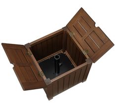 an open wooden box with a black object in the bottom right corner and two doors on each side