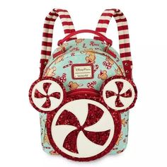 Loungefly Disney Mickey Mouse Holiday Treats Mini Backpack Get into the Christmas spirit with this festive mini backpack by Loungefly. This cute carryall features an allover print of holiday treats, striped shoulder straps, and a sequin Mickey Mouse front pocket with 3D ears for extra sweet holiday style. 59% PVC / 30% polyurethane / 11% PET 11'' H x 8 1/2'' W x 4'' D YJ-P8 Have a wonderful day and Make sure to check out the other items in my store! I appreciate your support for my small home business! Mickey Gingerbread, Lounge Fly, Billy Kid, Loungefly Mini Backpack, Cream Candy, Disney Bags, Disney Collage, Mini Backpacks, Loungefly Bag