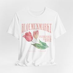 Let the colors of Amsterdam's Floating Flower Market inspire your wanderlust! Established in 1862, this iconic market is famous for its tulips and timeless charm. Dreaming of a vacation here? Let this tee take you there! 🌷✨ Our Designs are on a Bella Canvas unisex jersey airlume combed and ring-spun cotton tee! Features: Side seamed | crew neck | tailored fit | shoulder taping  Solid colors: 100% Airlume combed and ring-spun cotton. Heather colors: 99% Airlume combed and ring-spun cotton, 1% po Patriotic Tees, Floating Flowers, Floral Shirt, Flower Market, Tee Shop, Cotton Tee, Clothing Items, Favorite Outfit, Graphic Tees