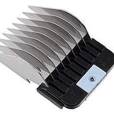 a set of knives sitting on top of a black holder with eight blades in it